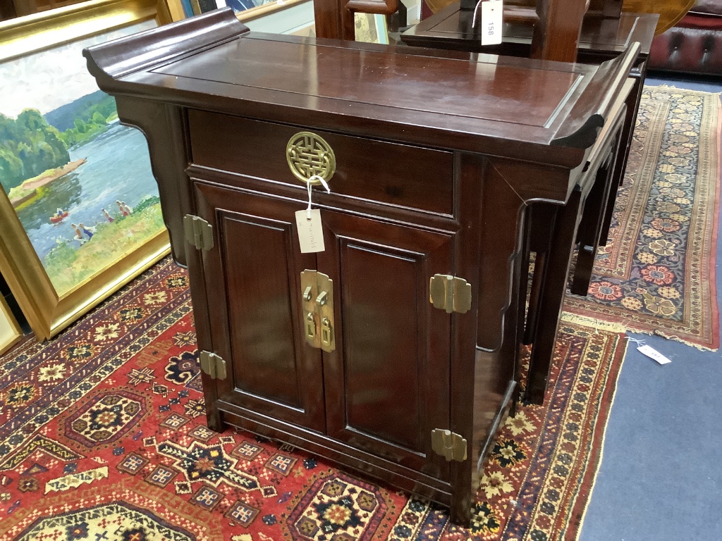 A 20th century Chinese hardwood low cabinet, with brass-fitted drawer and cupboard, width 74cm depth 36cm height 75cm